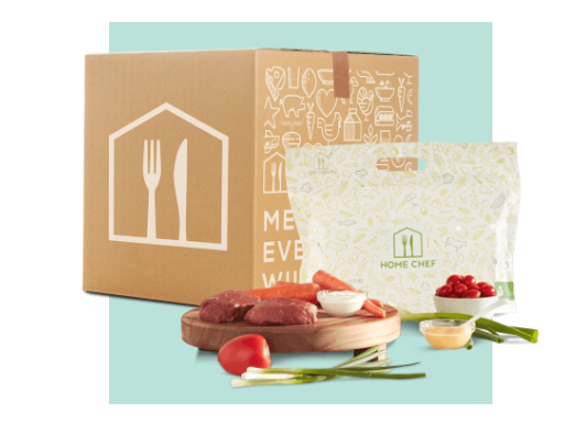 A Home Chef meal kit with various ingredients on display